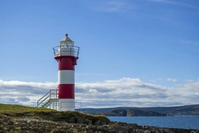 Free stock image of Light tower along coastline created by Geoffrey Whiteway